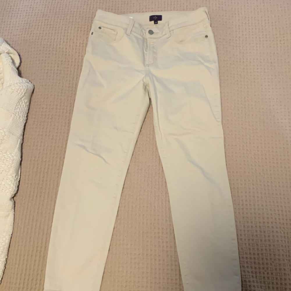Cream colored jeans. Ankle length